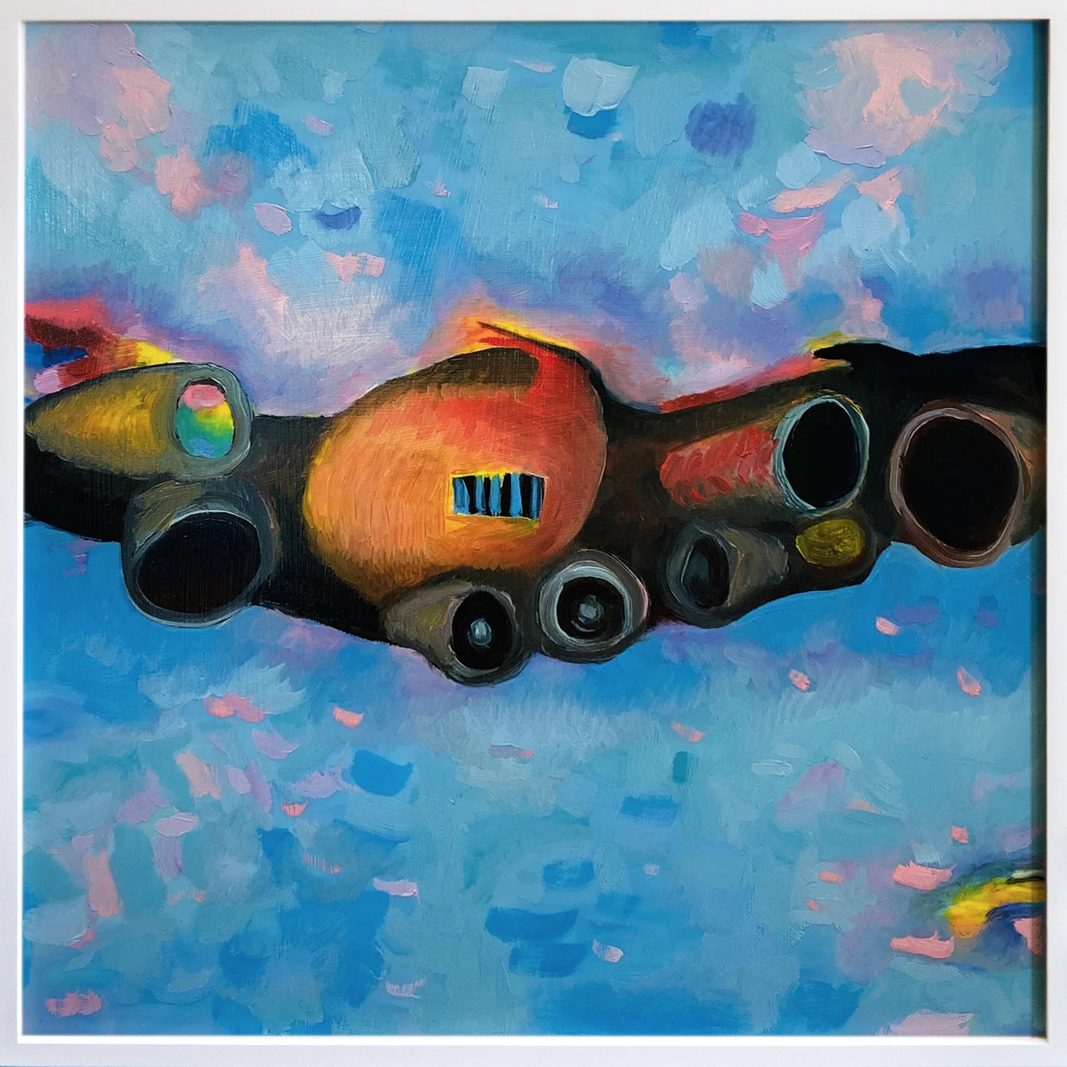 Engine City, 2019: a long engine with an orange body and dark round ports floats in a blue sky.