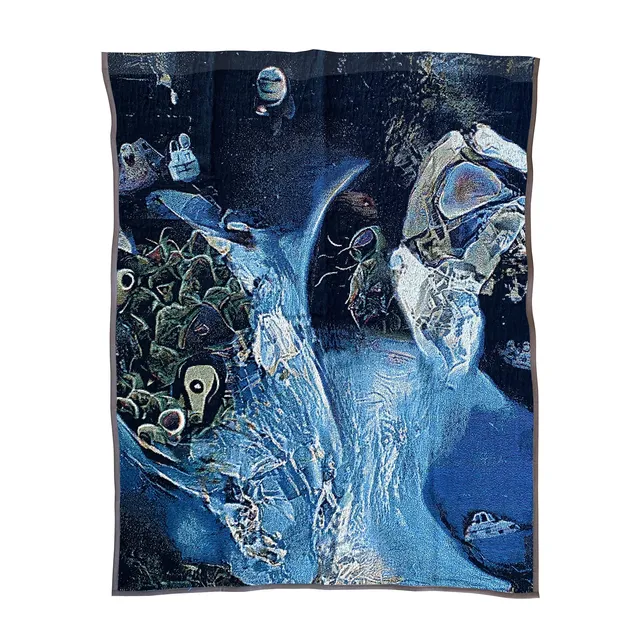 A woven tapestry of a swirling blue and white cosmic landscape scattered with small machines.